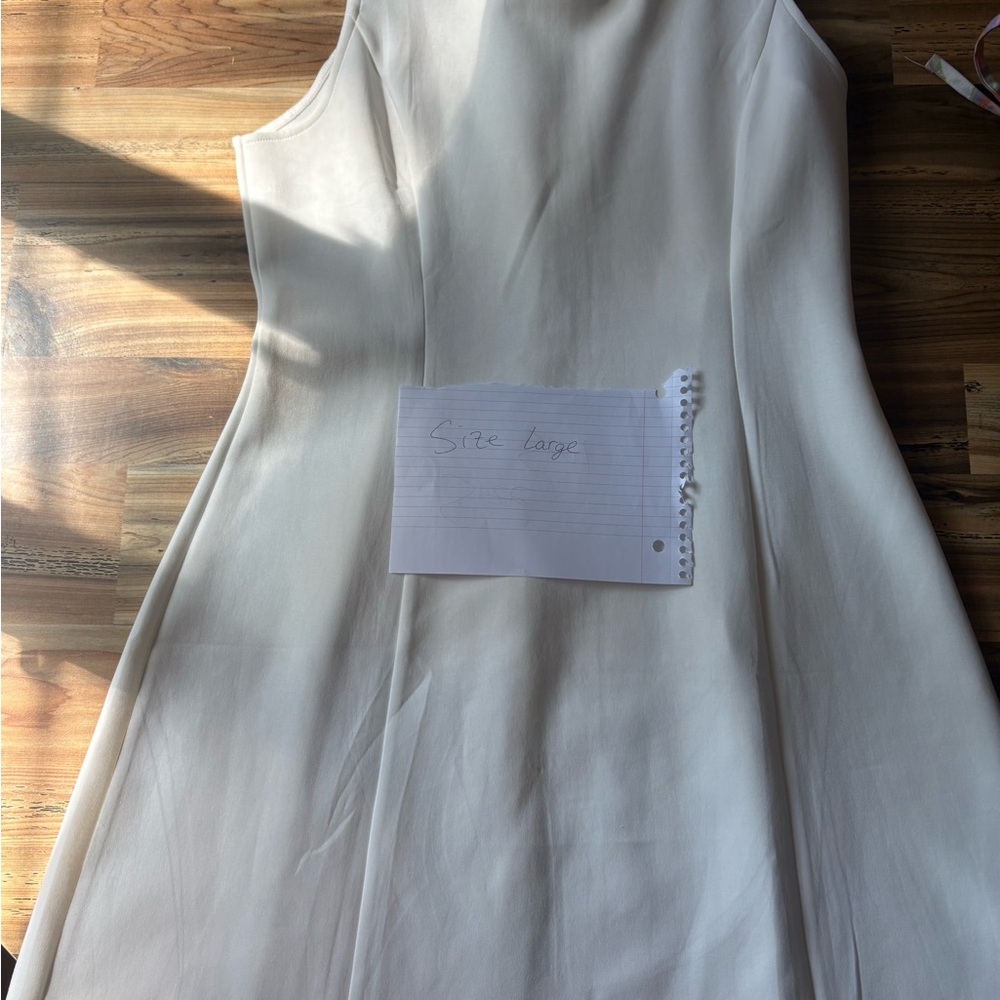 Elegant White Sleeveless Dress